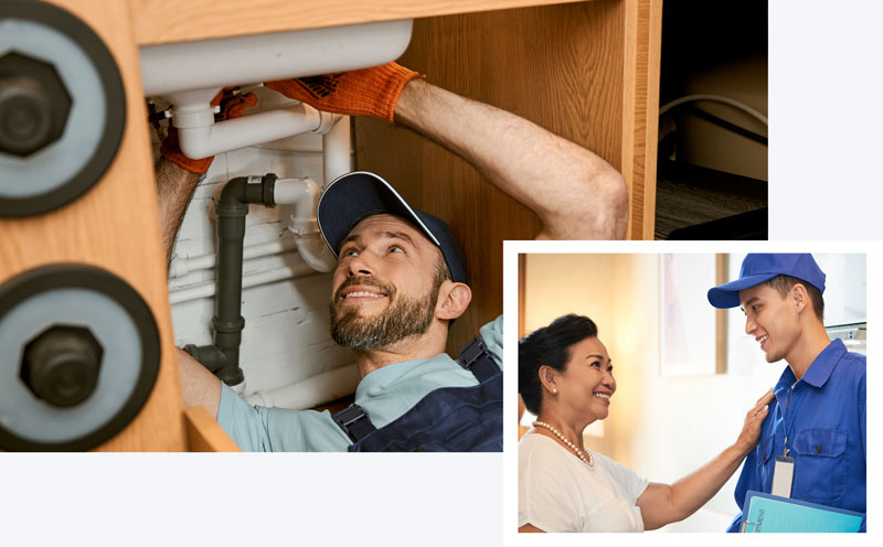 Plumber working under a sink.
